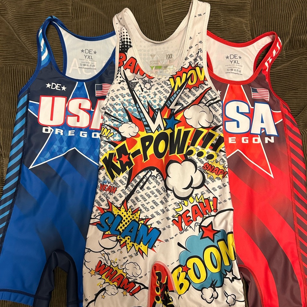 Lot of 3 YXL singlets in good condition.
